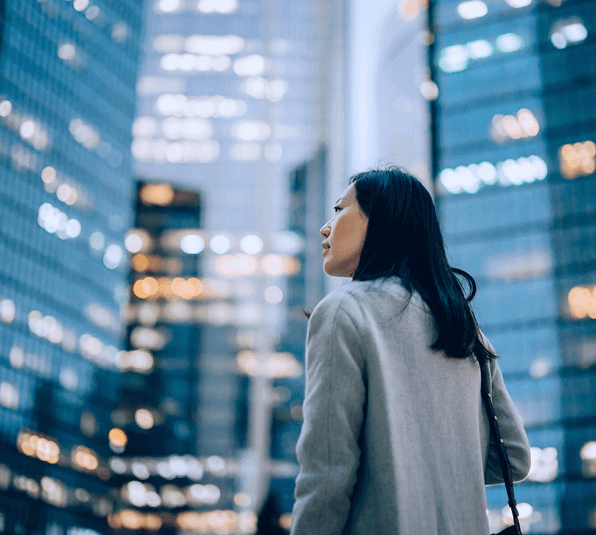 Woman against a city backdrop