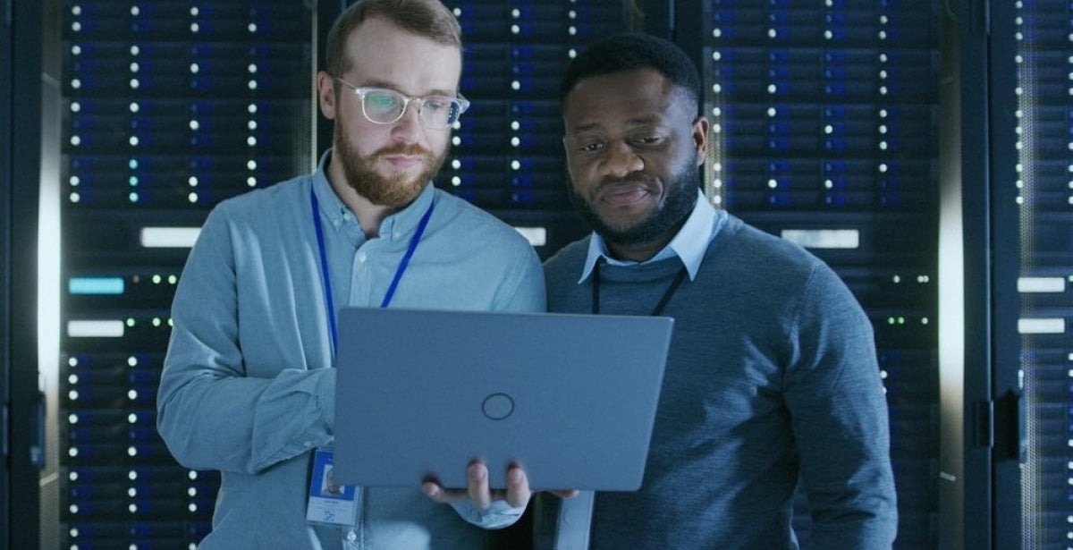 Two cyber security experts working together