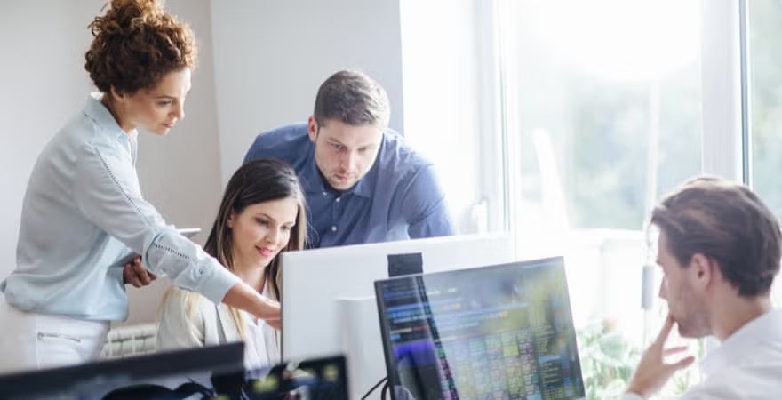 A group of colleagues collaborating together on a project